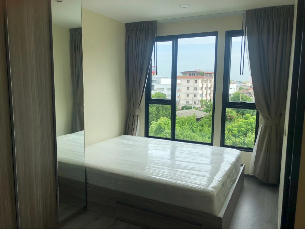 For rent: The Origin Ramintra 83 Station, a comfortable room with complete furniture and amenities. Open and airy view. Reserve now!