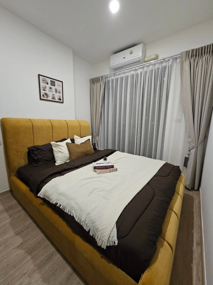 For rent: The Rich Rama 9-Srinakarin, a beautifully designed apartment fully furnished with appliances for comfortable living.