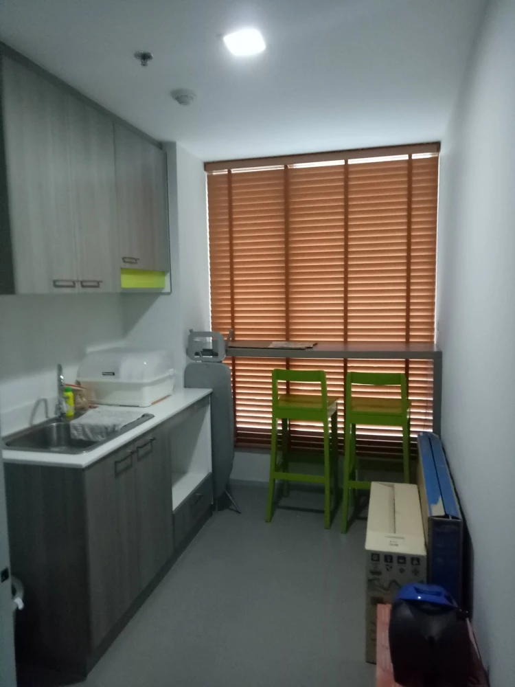 For sale: Greené Chaengwattana condo. Comfortable and spacious living area. Conveniently located near the Pink Line BTS Skytrain. Don't miss out!