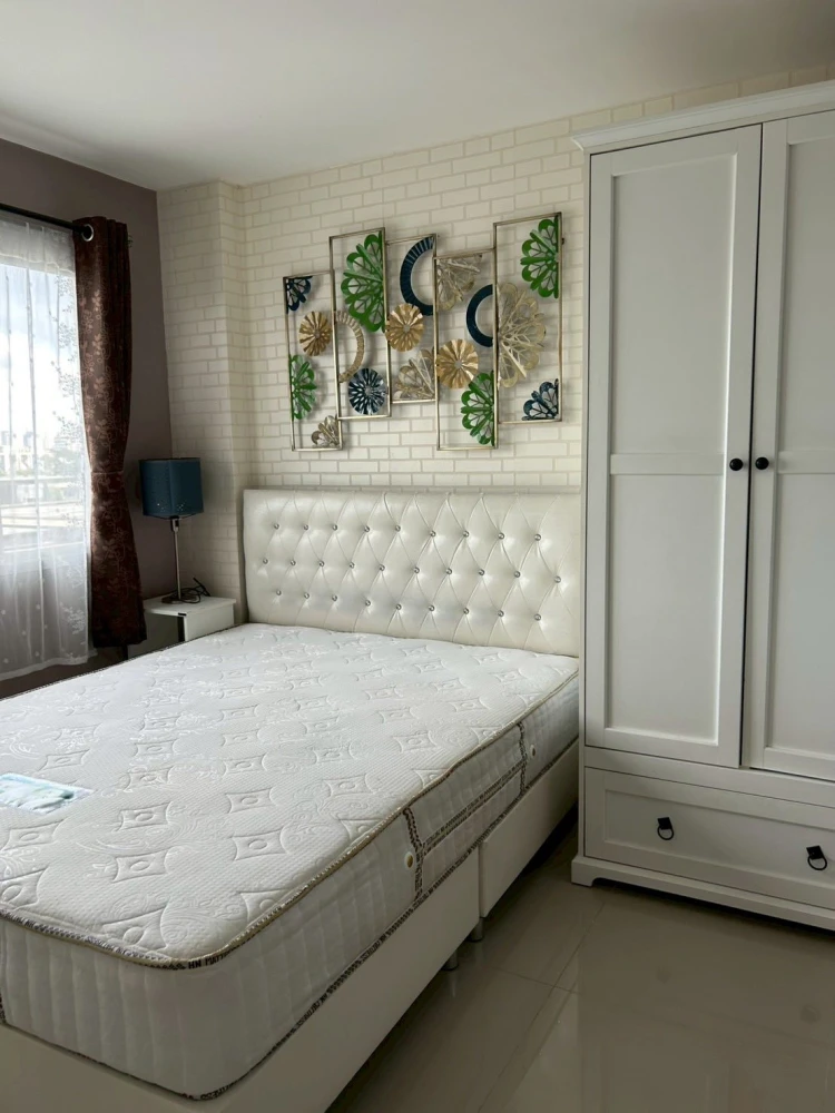 For sale: Lumpini Town Bodindecha-Ramkhamhaeng, fully furnished unit with air conditioning and all appliances included. Beautiful, clean, and comforta