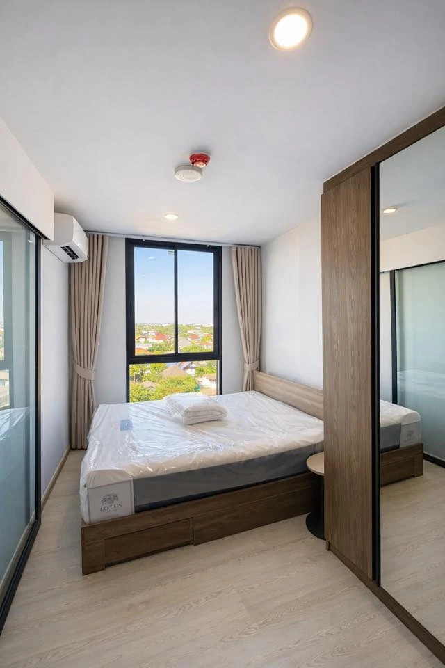 For rent: Nue Core Khu Khot Station studio room with north-facing balcony. Fully furnished and equipped. Don't miss out!