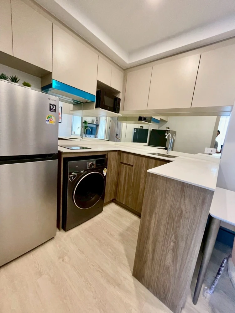 For rent condo Nue Core Khu Khot Station, quiet corner room, private, complete here, hurry and move in.