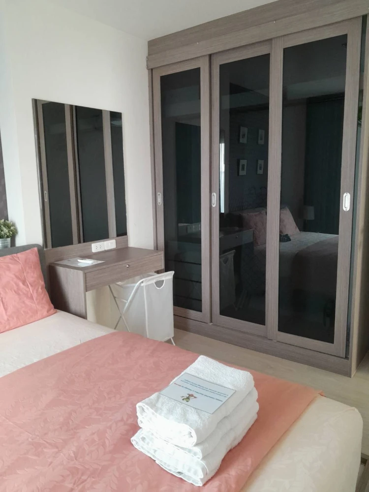 Selling a 2-bedroom Aspire Sathorn Thapra apartment. Features high-quality wallpaper and a bright, unobstructed view. Don't miss out!