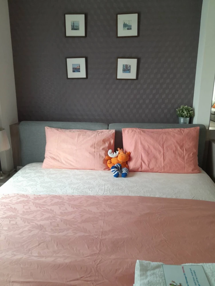 Selling a 2-bedroom Aspire Sathorn Thapra apartment. Features high-quality wallpaper and a bright, unobstructed view. Don't miss out!