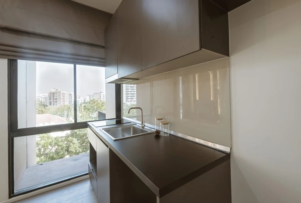Selling Brown Condo Ratchada 32, corner unit, 2 bedrooms, city view, ceiling speakers with Bluetooth sound system. Book now!