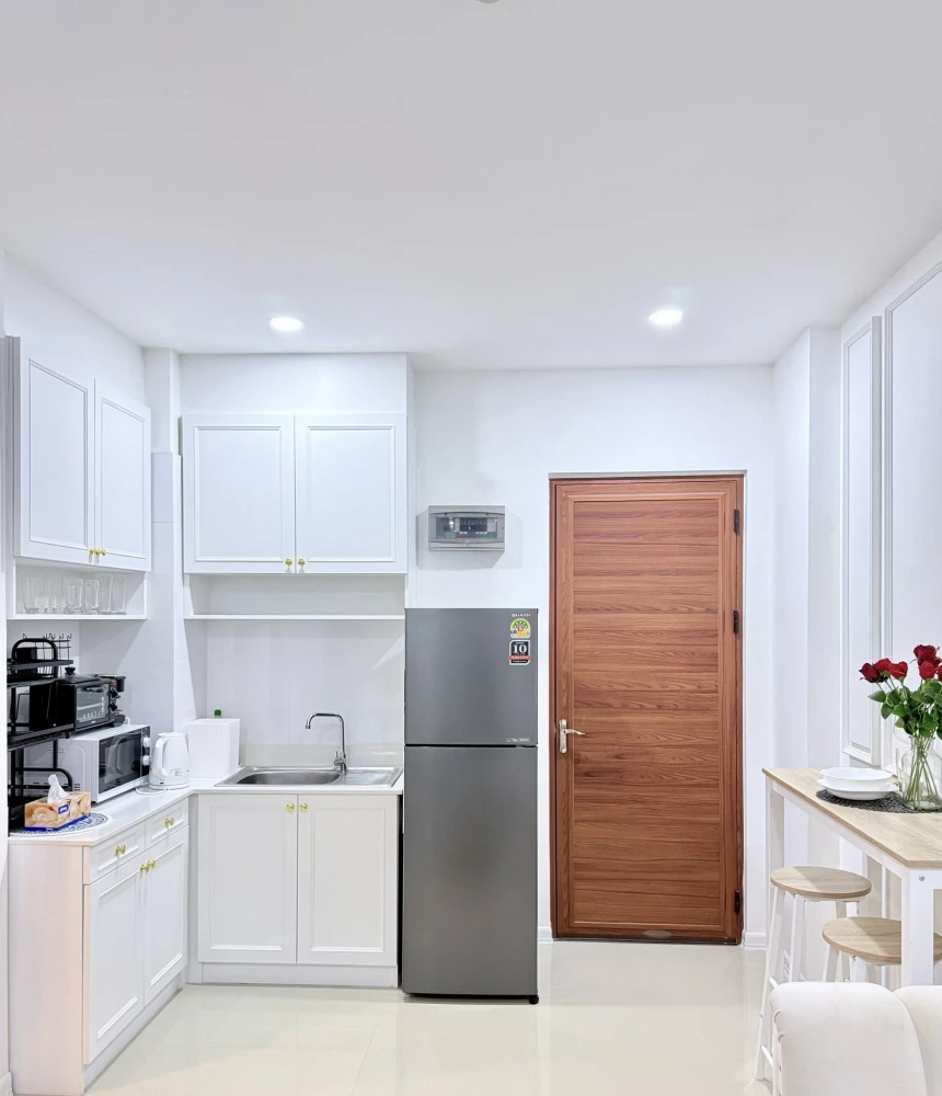 CC Condominium 1 for sale. Fully furnished with built-in furniture and appliances. Clean white decor, very comfortable and inviting.