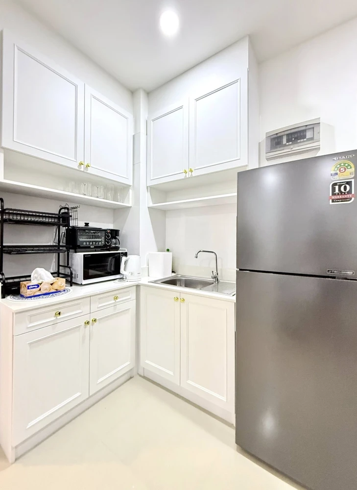 CC Condominium 1 for sale. Fully furnished with built-in furniture and appliances. Clean white decor, very comfortable and inviting.