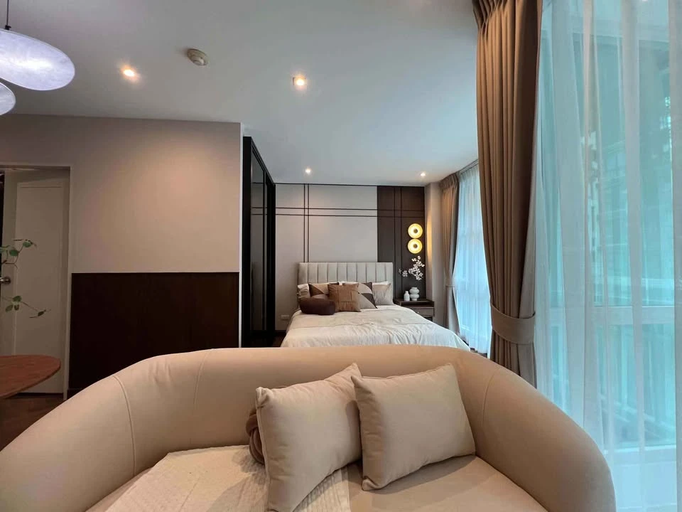 For Sale: D65 Condominium unit featuring a "Japandi Warm" style—a sophisticated blend of walnut wood, cream, and black tones that feels both cozy and