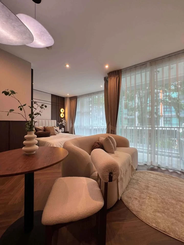 For Sale: D65 Condominium unit featuring a "Japandi Warm" style—a sophisticated blend of walnut wood, cream, and black tones that feels both cozy and