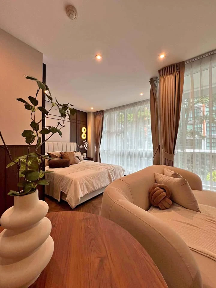 For Sale: D65 Condominium unit featuring a "Japandi Warm" style—a sophisticated blend of walnut wood, cream, and black tones that feels both cozy and