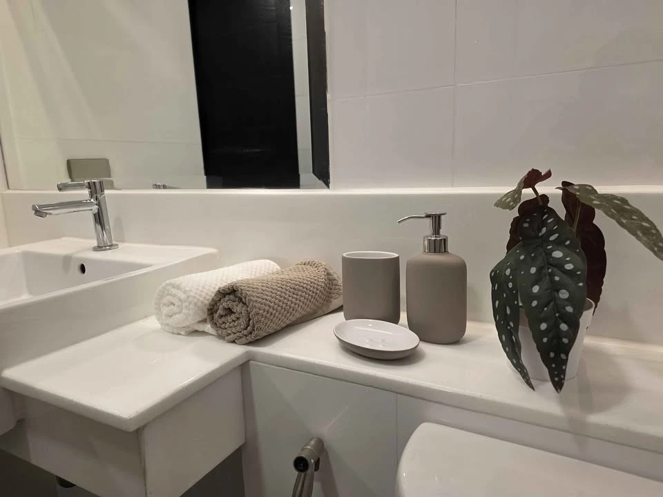 For Sale: D65 Condominium unit featuring a "Japandi Warm" style—a sophisticated blend of walnut wood, cream, and black tones that feels both cozy and