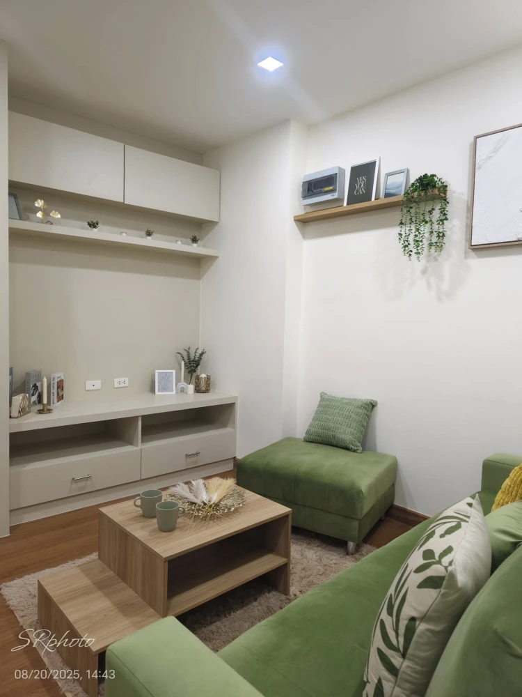 Happy Condo Ladprao 101 for sale, a room with a soothing green tone, fully furnished with built-in furniture and a kitchen set. Reserve now!
