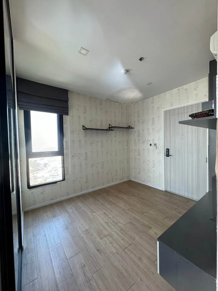 Selling a 1 Bed Plus corner unit in Notting Hill Leamchabang, located in the right building at the front of the condo, with a view of Kasetsart Univer