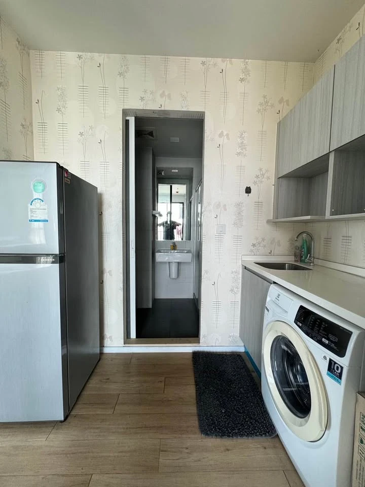 Selling a 1 Bed Plus corner unit in Notting Hill Leamchabang, located in the right building at the front of the condo, with a view of Kasetsart Univer