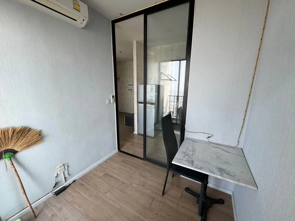 Selling a 1 Bed Plus corner unit in Notting Hill Leamchabang, located in the right building at the front of the condo, with a view of Kasetsart Univer