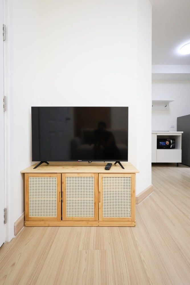 Plum Condo Ladprao 101 for sale. Ready to move in, fully furnished, clean white color scheme. Just bring your personal belongings and you can move rig