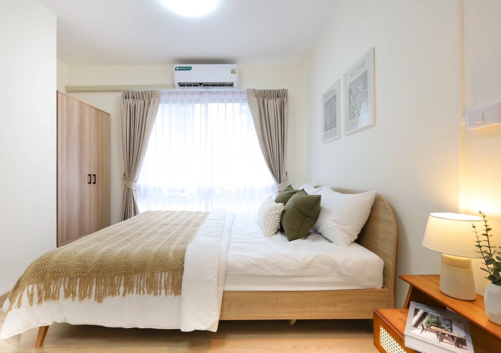 Plum Condo Ladprao 101 for sale. Ready to move in, fully furnished, clean white color scheme. Just bring your personal belongings and you can move rig