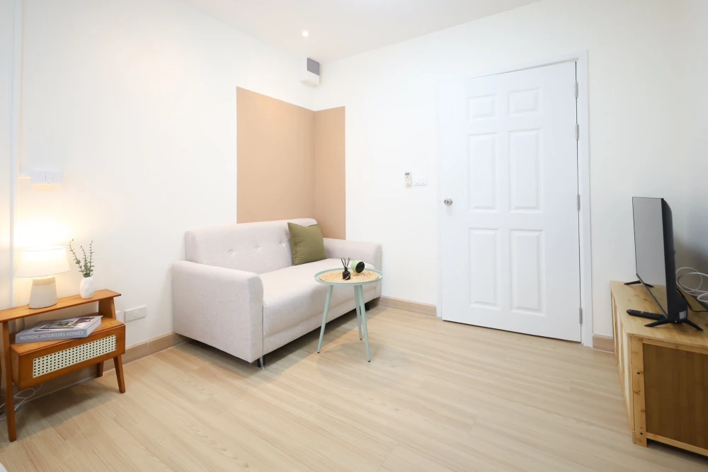 Plum Condo Ladprao 101 for sale. Ready to move in, fully furnished, clean white color scheme. Just bring your personal belongings and you can move rig