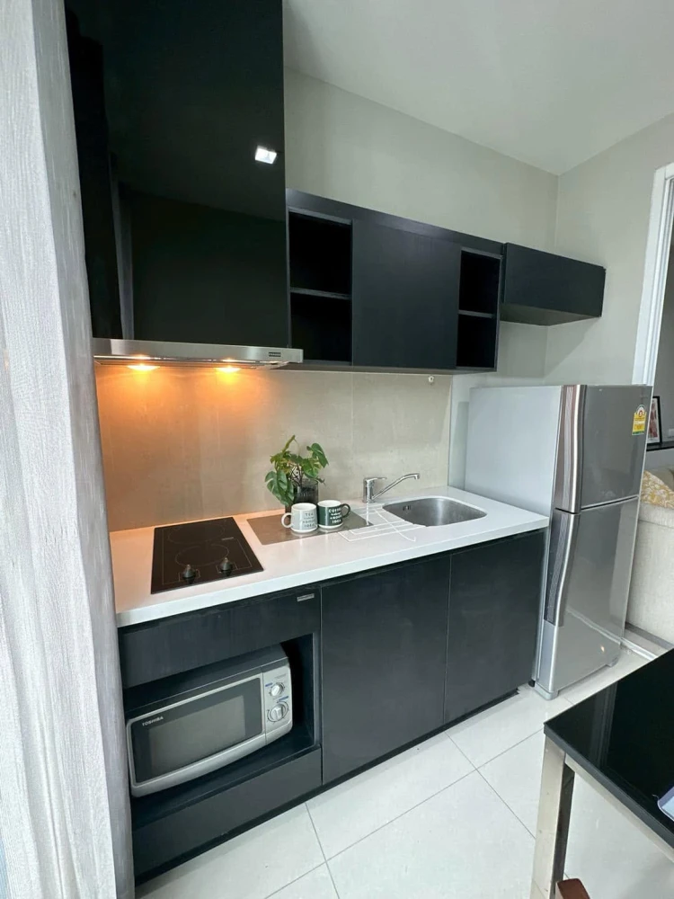 For sale: RHYTHM Sukhumvit 44/1. Modern interior design with dark tones and high-quality materials. Don't miss this opportunity!