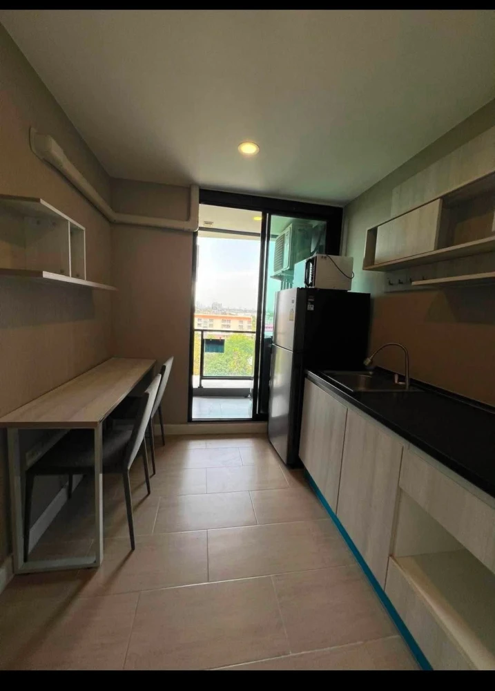 Selling a unit at The Cube Station Ramintra 109, 7th floor, fully furnished with high-quality built-in furniture. Don't miss this opportunity!