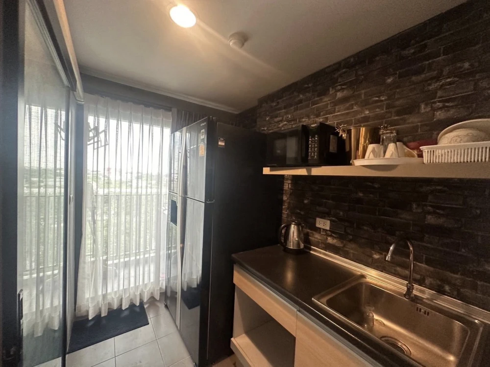 For sale: The Excel Khu Khot, 1 bedroom, 1 bathroom, fully furnished, with quality wallpaper. Don't miss out!