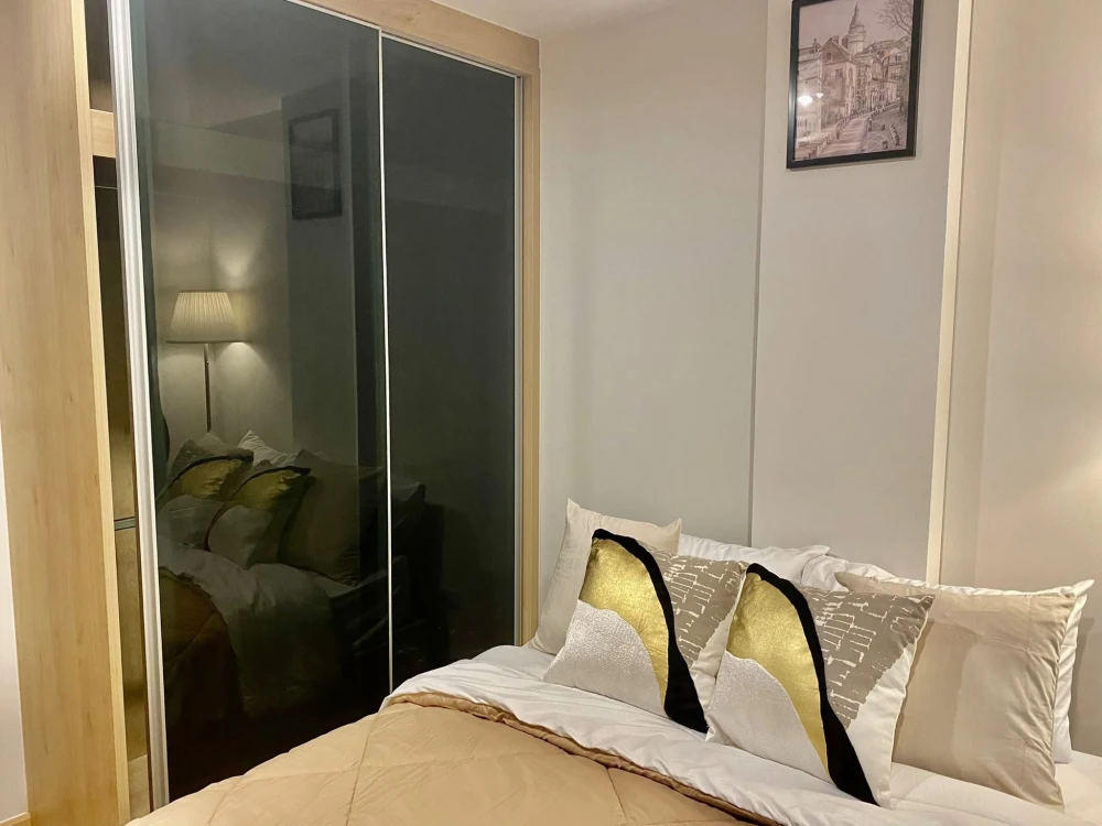 For sale: The Excel Ratchada 18, corner unit with privacy, decorated in a neutral tone, garden view, not hot, fully furnished, reserve now!