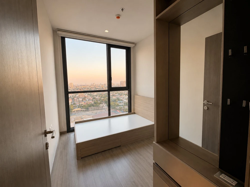 Selling a corner unit at The Line Wongsawang. Private, on the 22nd floor with unobstructed city views. North-facing, avoiding the afternoon sun, makin