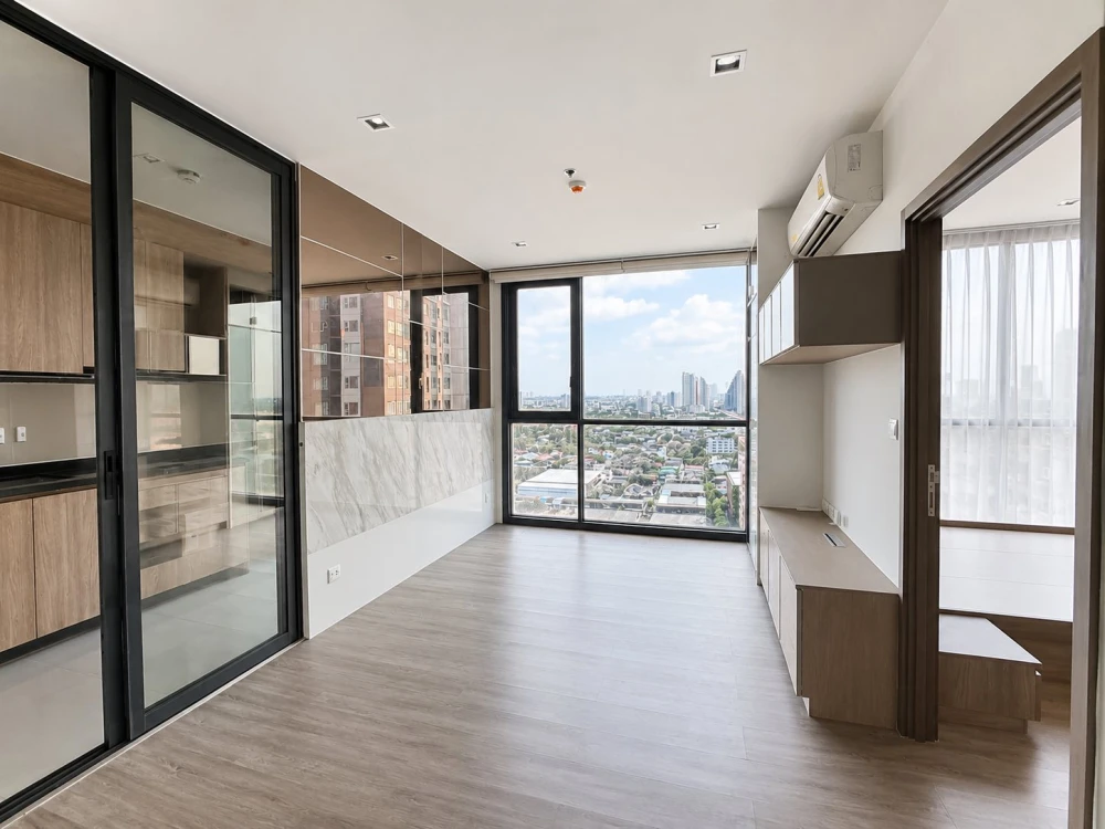 Selling a corner unit at The Line Wongsawang. Private, on the 22nd floor with unobstructed city views. North-facing, avoiding the afternoon sun, makin