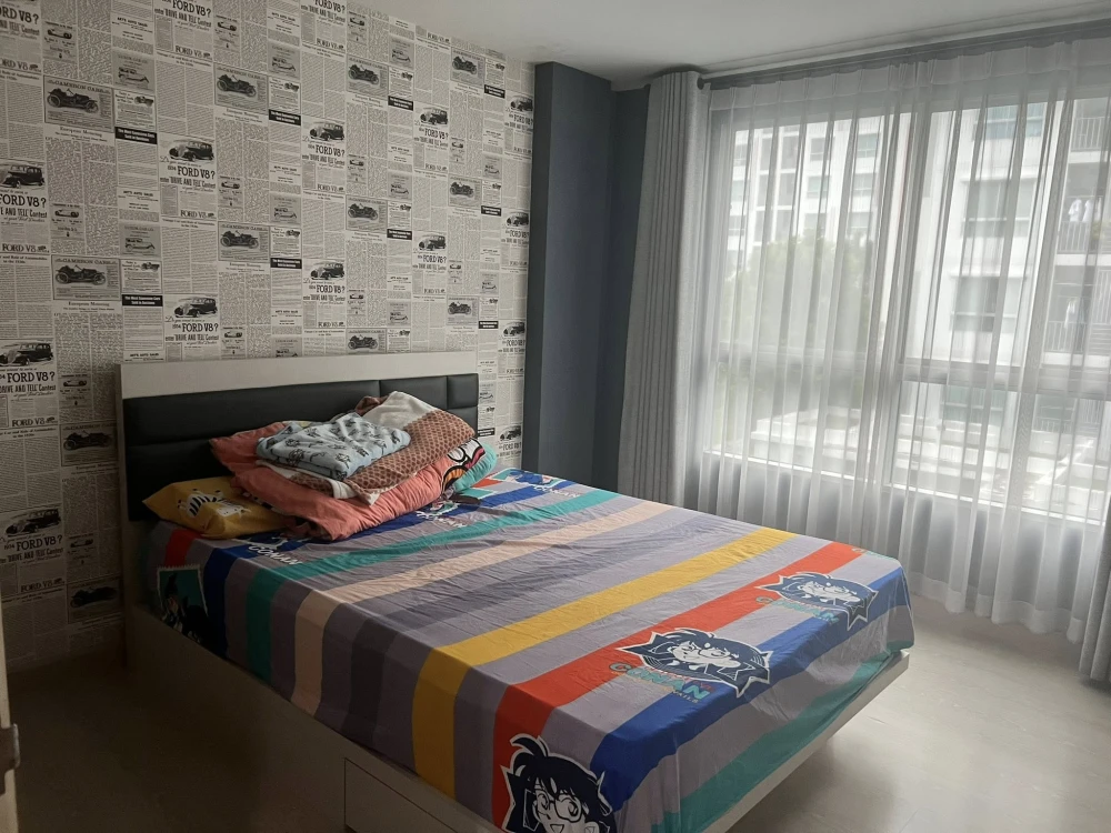 For sale: The Niche ID Rama 2, wallpapered throughout the room, with blackout curtains, swimming pool view, very attractive.