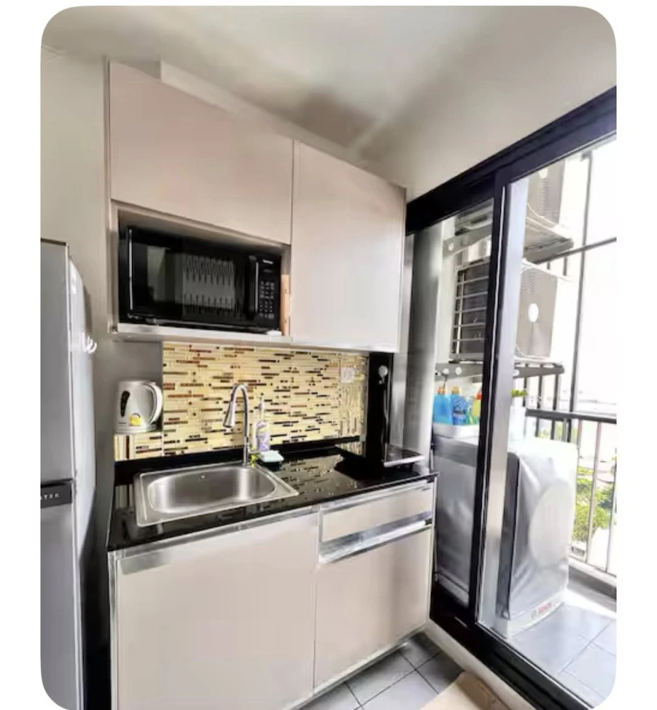 Selling the Politan Rive, a room with built-in cabinets, beautiful city view, no blocked views, ready to book now.