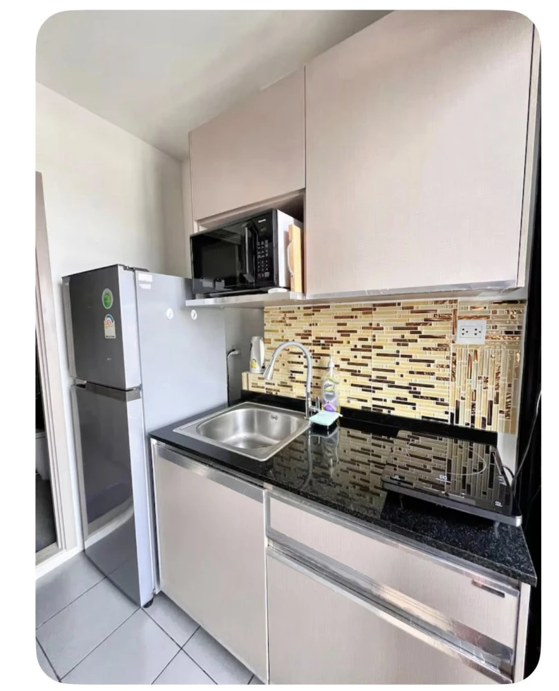Selling the Politan Rive, a room with built-in cabinets, beautiful city view, no blocked views, ready to book now.