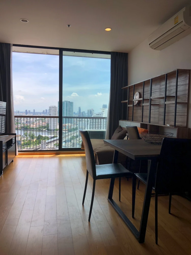 For sale: Noble Revo Silom family condo, high floor, beautiful river and city view from every angle. Buy now, don't miss out!
