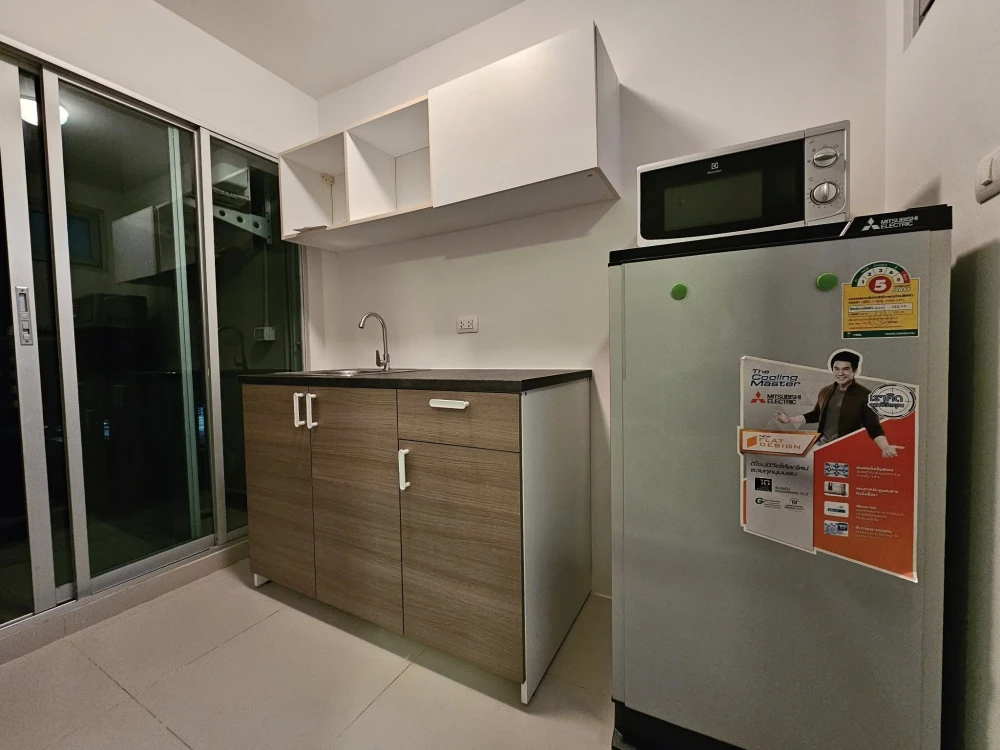 For sale rent: D Condo Campus Rangsit Phase 2. Comfortable living, definitely not hot. Cool, airy rooms. Ready to move in immediately!