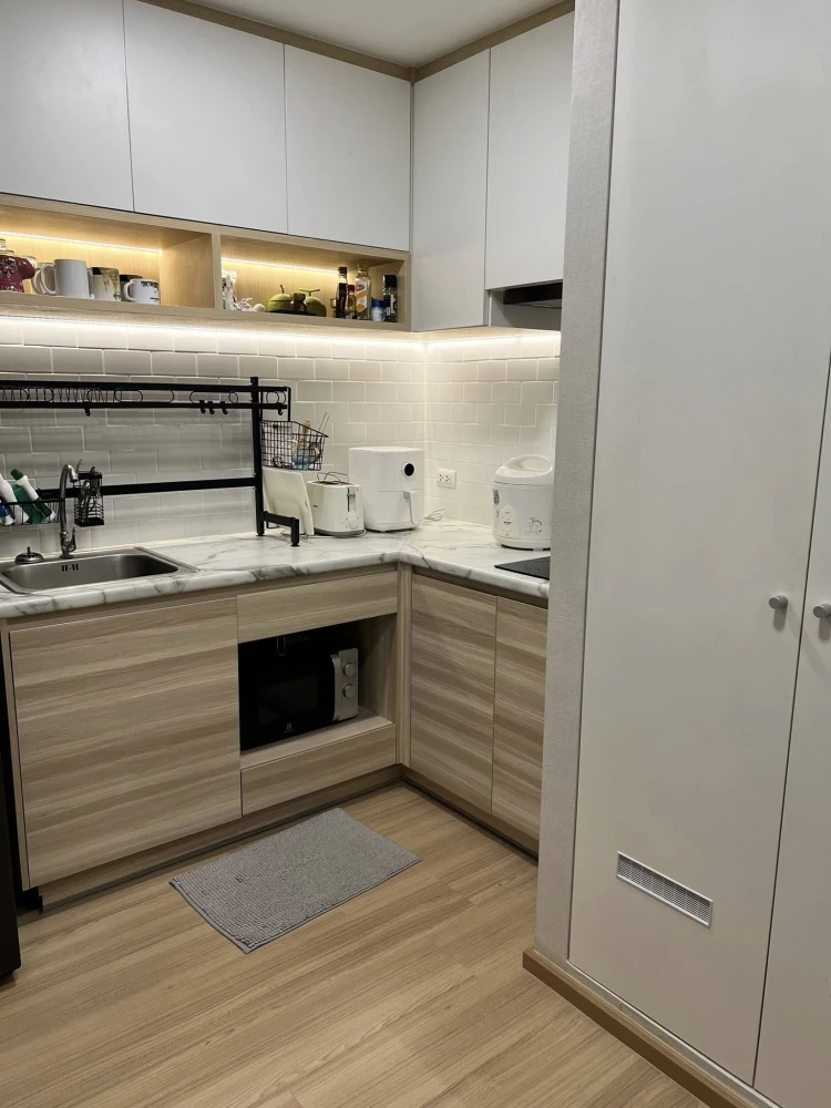 Plum Condo Mix Chaengwattana for sale. Very well maintained, **built-in furniture throughout**, beautiful condition, ready to move in immediately.