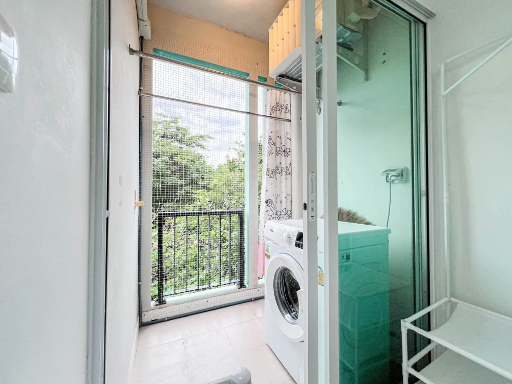 For sale: Studio unit at Unio Charan 3, featuring a partitioned bedroom. Located near the elevator with a garden view and no immediate neighbors—book