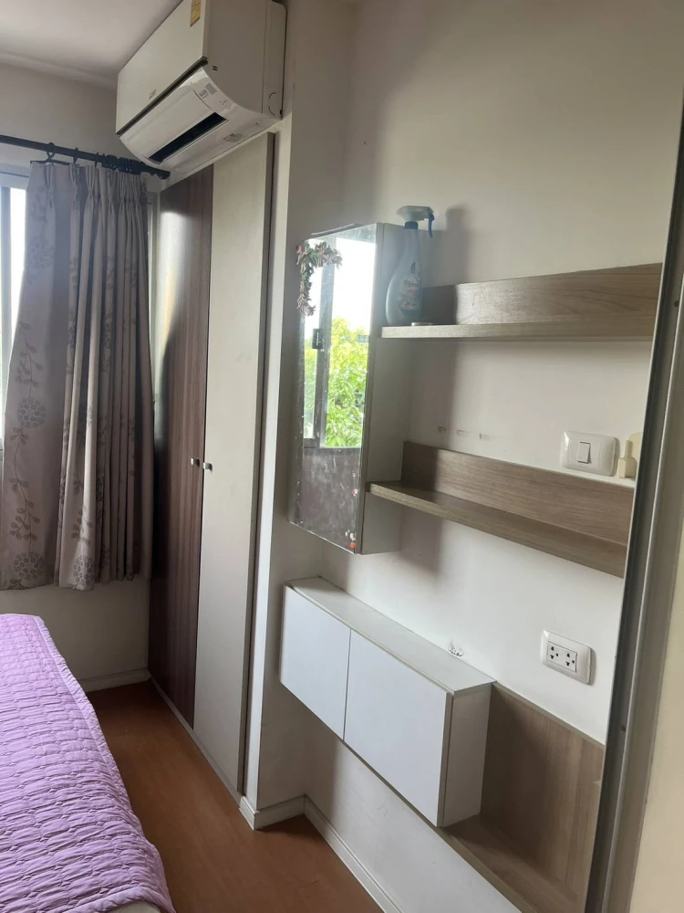 For sale: Lumpini Condo Town Nida-Seri Thai 2, 2nd floor room, can see the treetops behind the room, very shady, reserve now, don't wait.