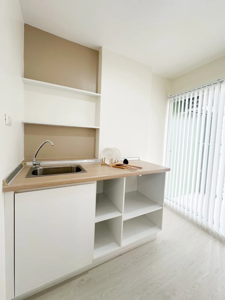 For sale: Lumpini Condo Town Ramintra - Ladprao 2. Fully furnished, SPC flooring, beautifully decorated. Don't miss out!