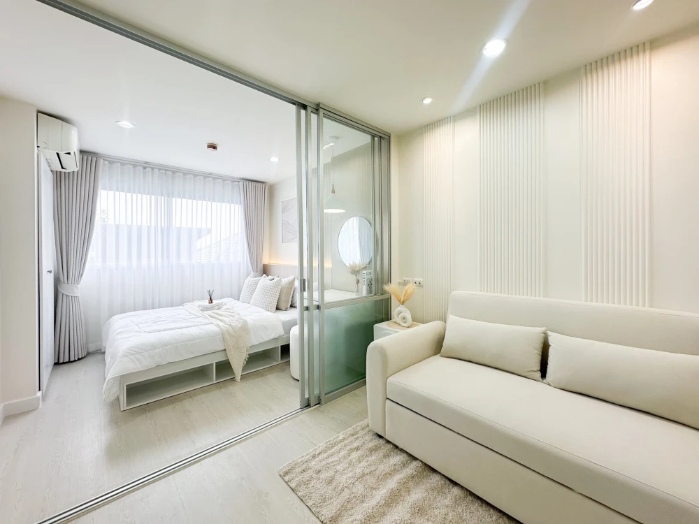 For sale: Lumpini Condo Town Ramintra - Ladprao 2. Fully furnished, SPC flooring, beautifully decorated. Don't miss out!