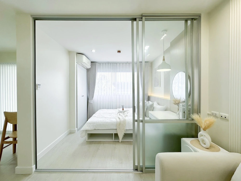 For sale: Lumpini Condo Town Ramintra - Ladprao 2. Fully furnished, SPC flooring, beautifully decorated. Don't miss out!