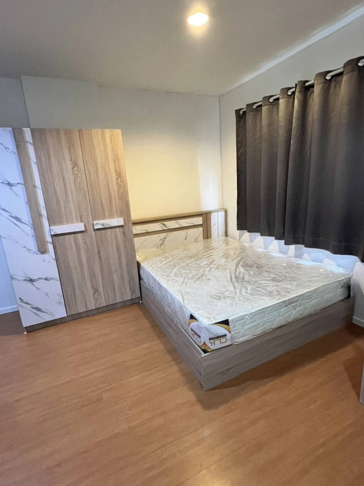 For sale: Lumpini Township Rangsit Klong 1, Building E4, 1st floor, with trees on the balcony, very shady, fully furnished, don't miss out!