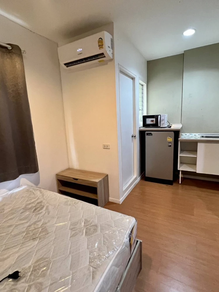 For sale: Lumpini Township Rangsit Klong 1, Building E4, 1st floor, with trees on the balcony, very shady, fully furnished, don't miss out!