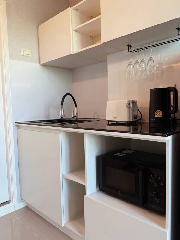 For sale: Lumpini Ville Naklua - Wongamat, Building C, 7th floor, sea view. Beautifully built-in furnishings throughout. Don't miss out!