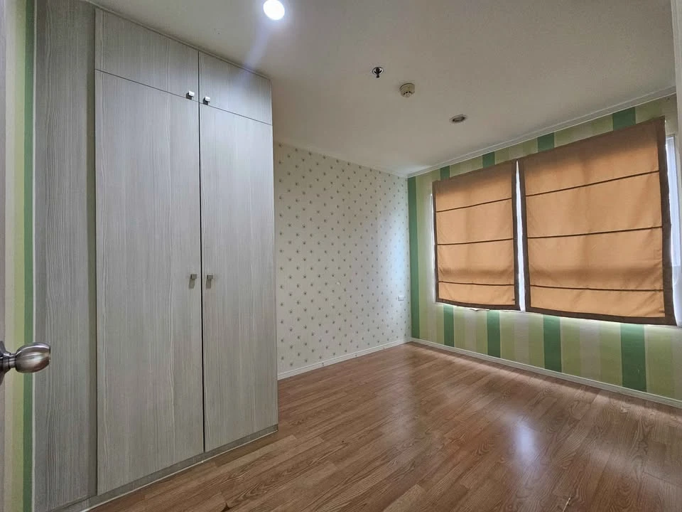 For sale: Lumpini Ville Sukhumvit 77, unfurnished unit. Clean, bright, and airy, with beautiful wallpaper throughout. Book now!