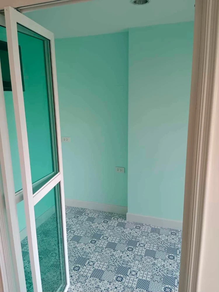 For sale: Lumpini Place Narathiwas 24. The unit is unfurnished except for one sofa. It's very clean, bright, and airy, allowing you to decorate it to