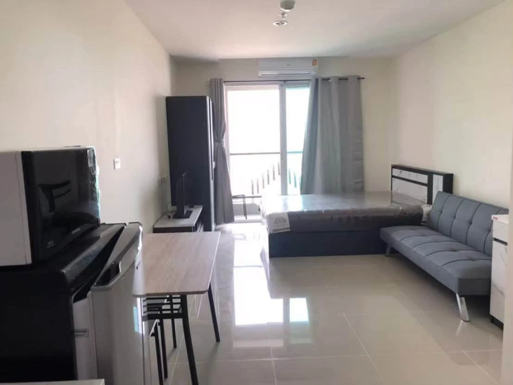 For sale: Assakarn Place Srinakarin. Located on a very high floor with a stunning city view. Comes fully furnished—book now before it’s gone!
