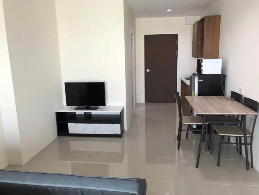 For sale: Assakarn Place Srinakarin. Located on a very high floor with a stunning city view. Comes fully furnished—book now before it’s gone!