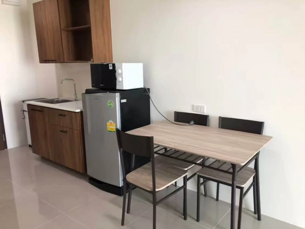 For sale: Assakarn Place Srinakarin. Located on a very high floor with a stunning city view. Comes fully furnished—book now before it’s gone!