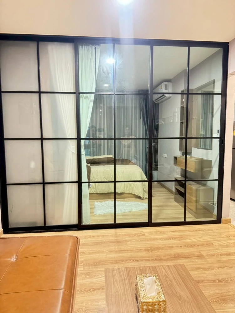 For sale: The Cube Loft Lat Phrao 107, decorated in a modern loft style, panoramic city view, with Bluetooth speakers embedded in the ceiling. Don't m