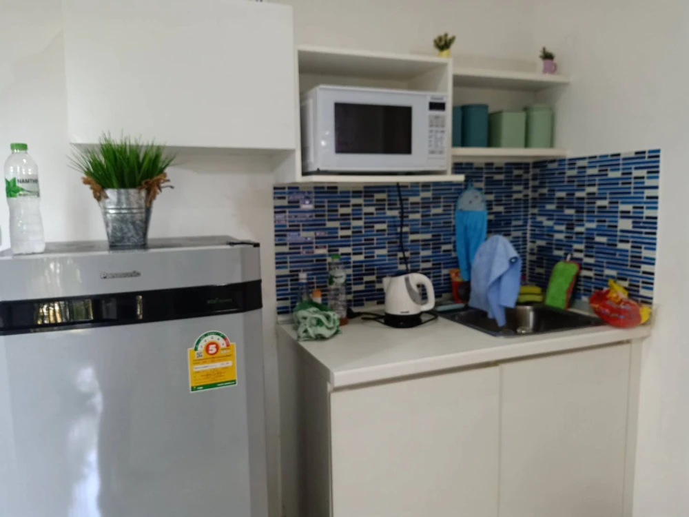For sale: Natureza Art, North Pattaya, 3rd floor, garden view, wallpapered throughout, fully furnished, clean, quiet, suitable for living.