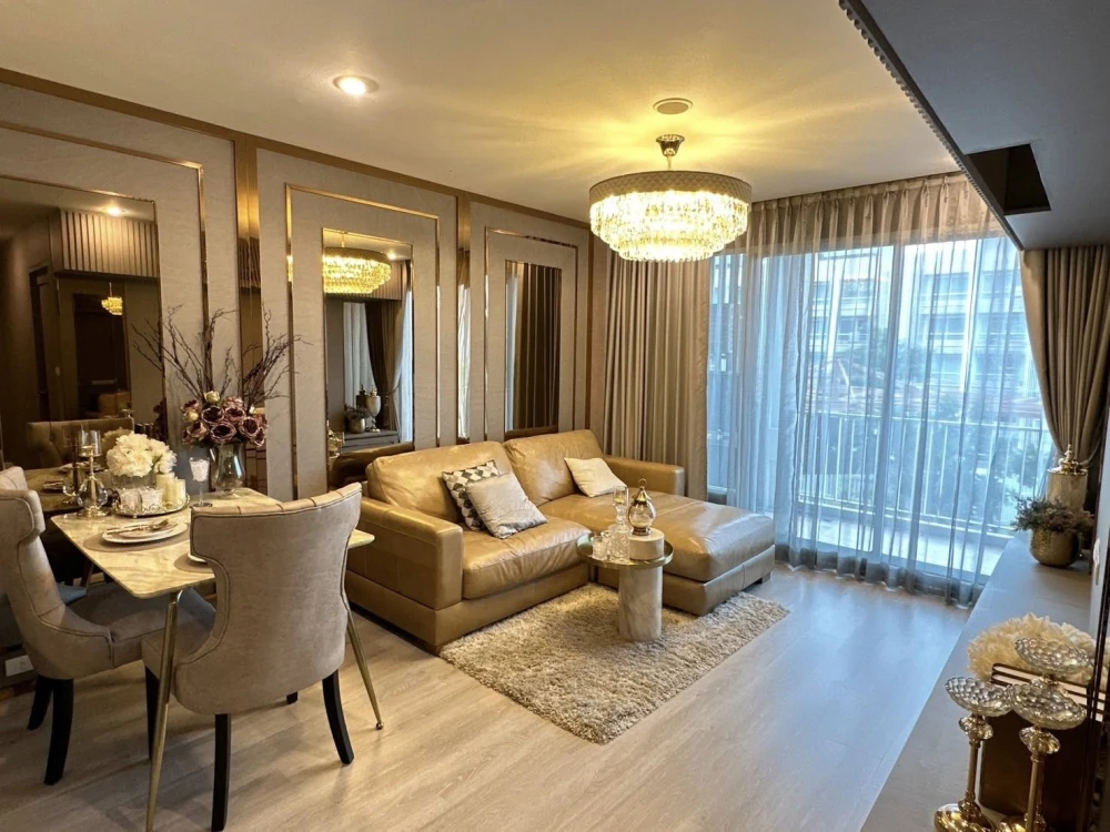For sale or rent: Happy Condo Ladprao 101. Fully furnished unit with spacious living area, 4th floor, pool view, and large balcony. Book now!